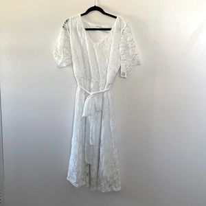 Worn once for my own bridal shower. Stretchy lace and extremely comfortable!